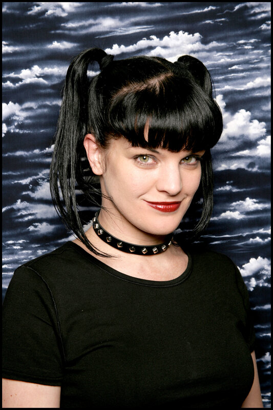 woman with pigtails and choker