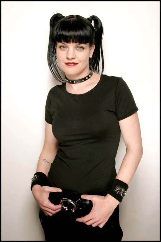 woman with pigtails and choker