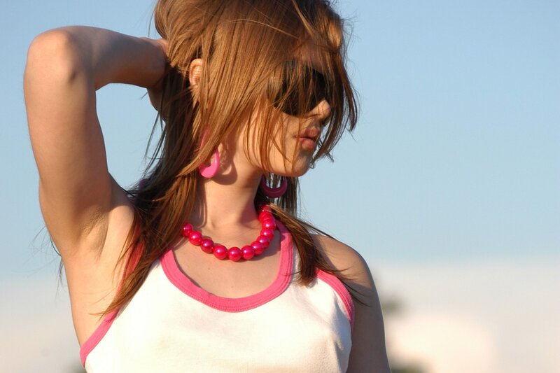 woman with pink accessories