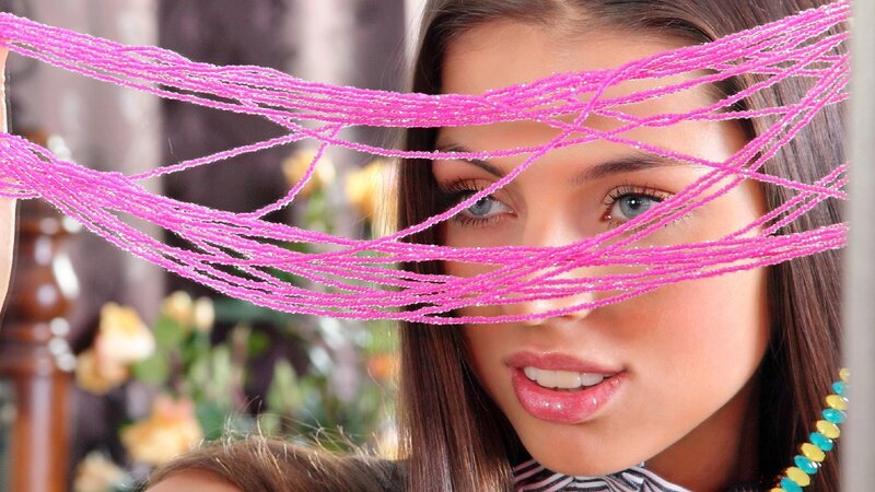 woman with pink beads