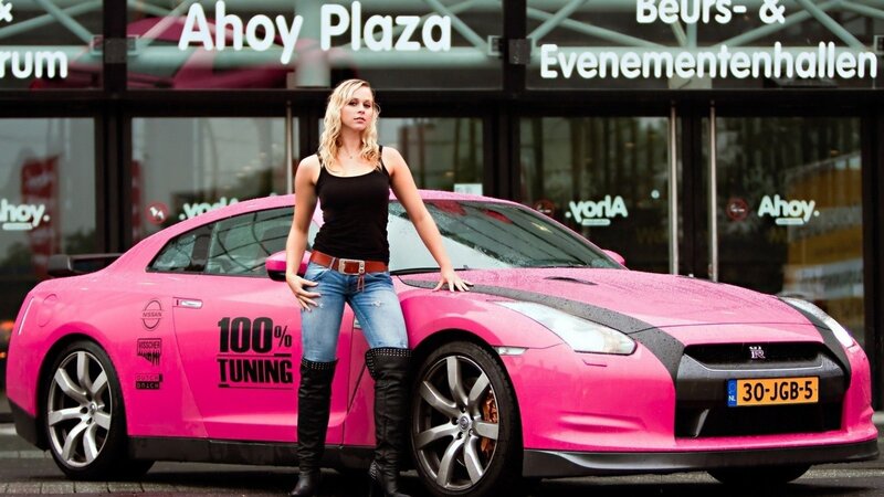 Woman with Pink Car — Confident, Afternoon, Photograph, Building