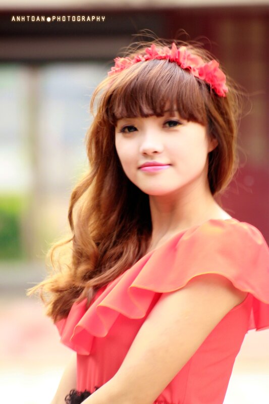 woman with pink dress and flower crown