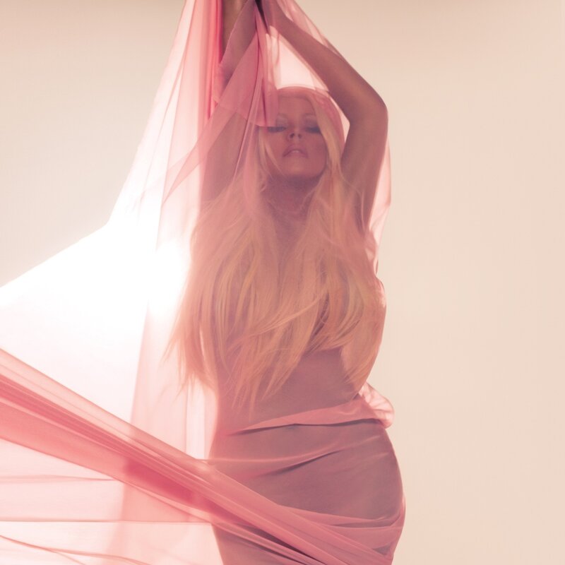 woman with pink fabric