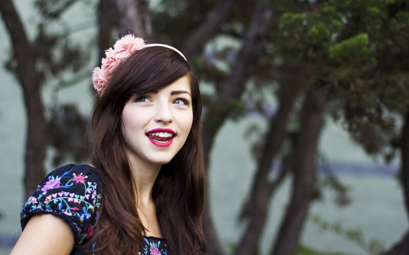 woman with pink flower crown