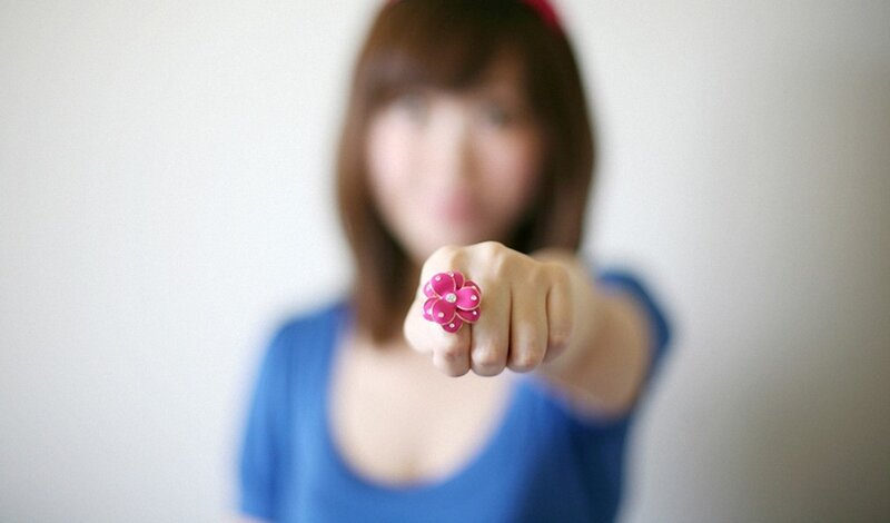 woman with pink flower ring