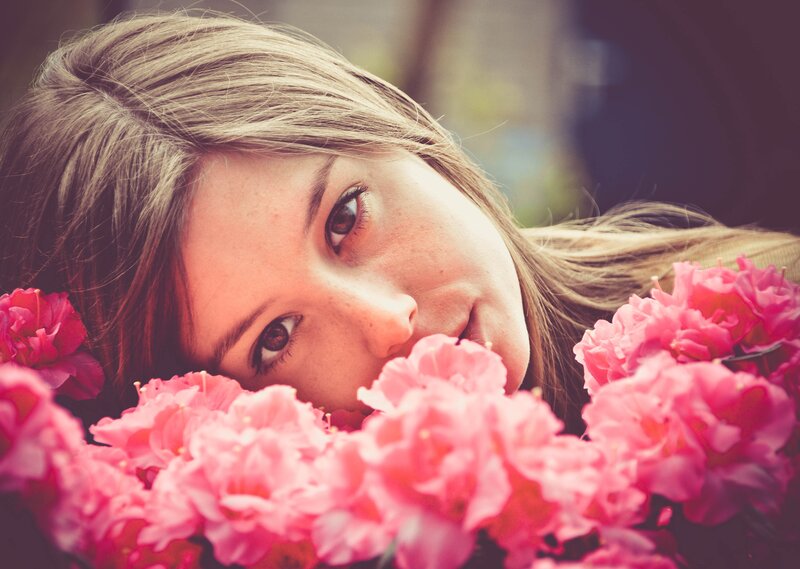 woman with pink flowers