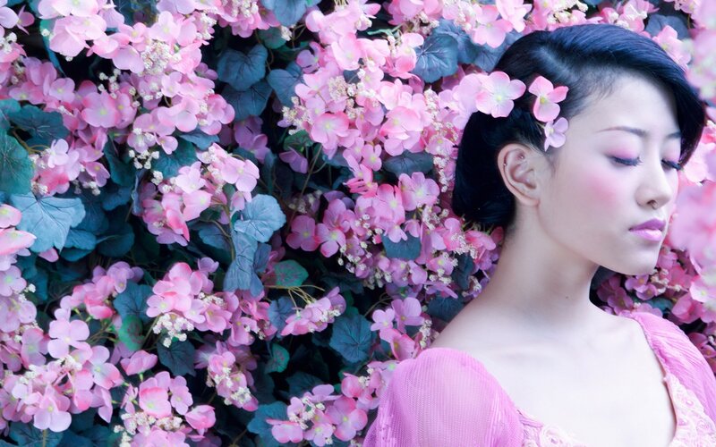 woman with pink flowers