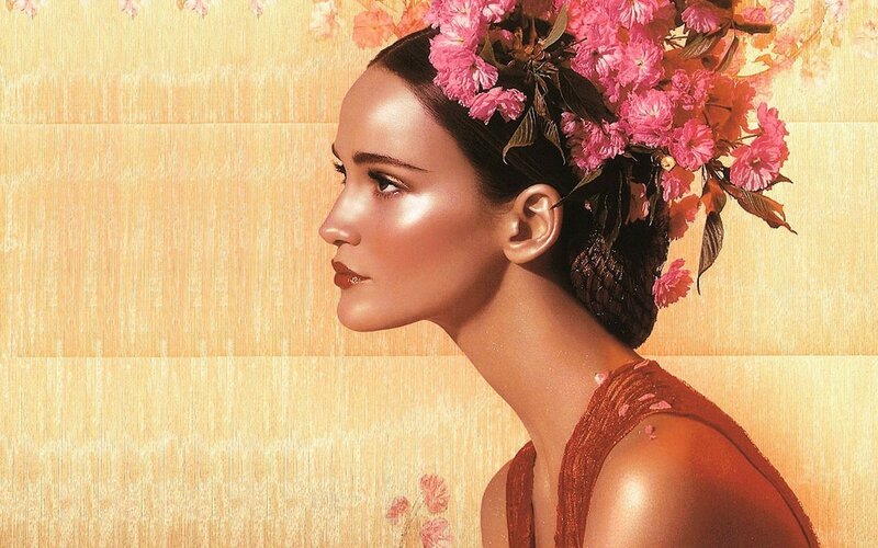 woman with pink flowers in hair