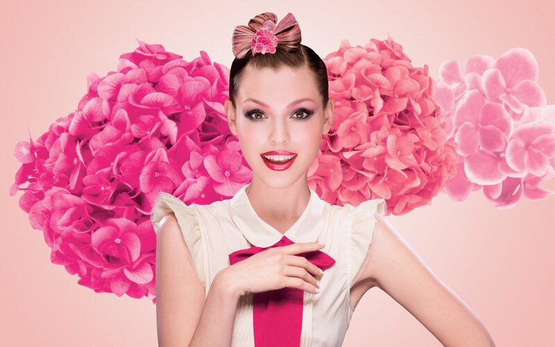 Woman with Pink Flowers — Playful, Photograph