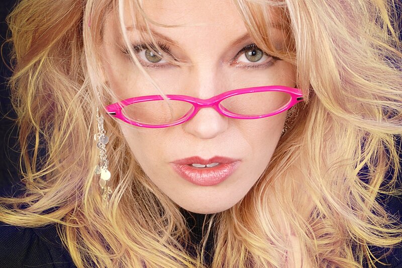 woman with pink glasses