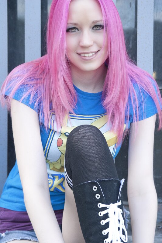 woman with pink hair and boots