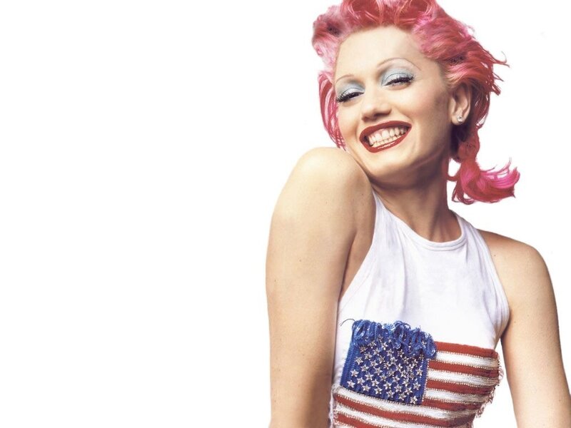 woman with pink hair and flag top