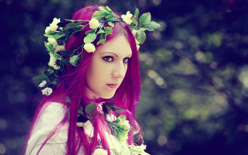 woman with pink hair and flower crown