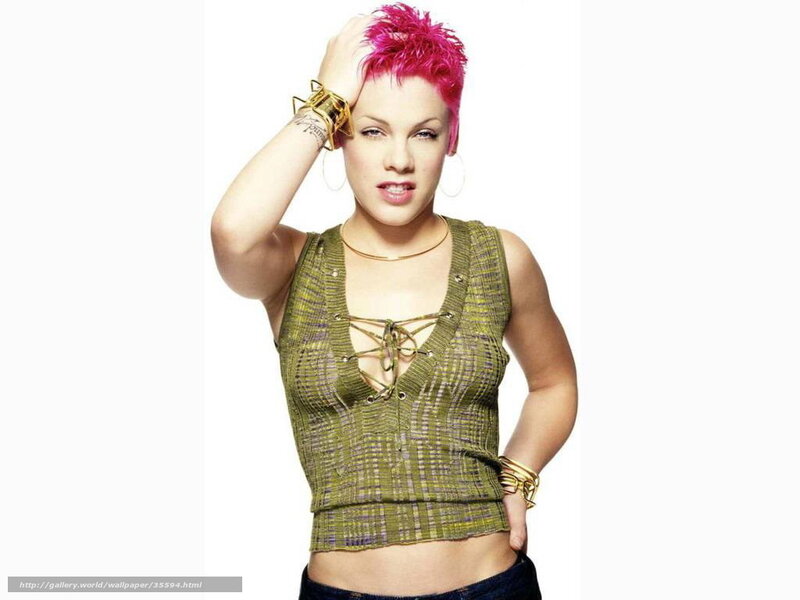 woman with pink hair and green top