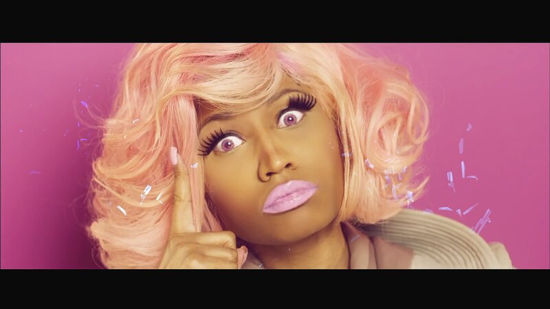 woman with pink hair and makeup