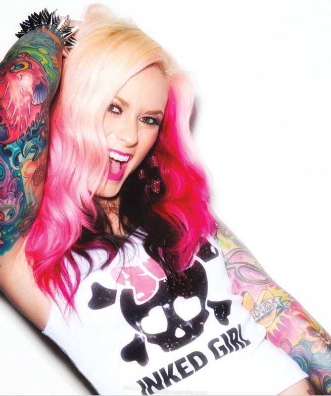 woman with pink hair and tattoos