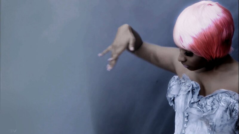woman with pink hair dancing