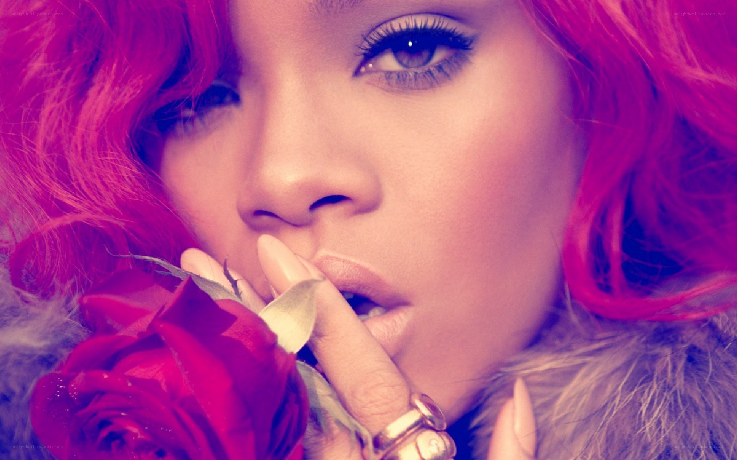 woman with pink hair holding rose