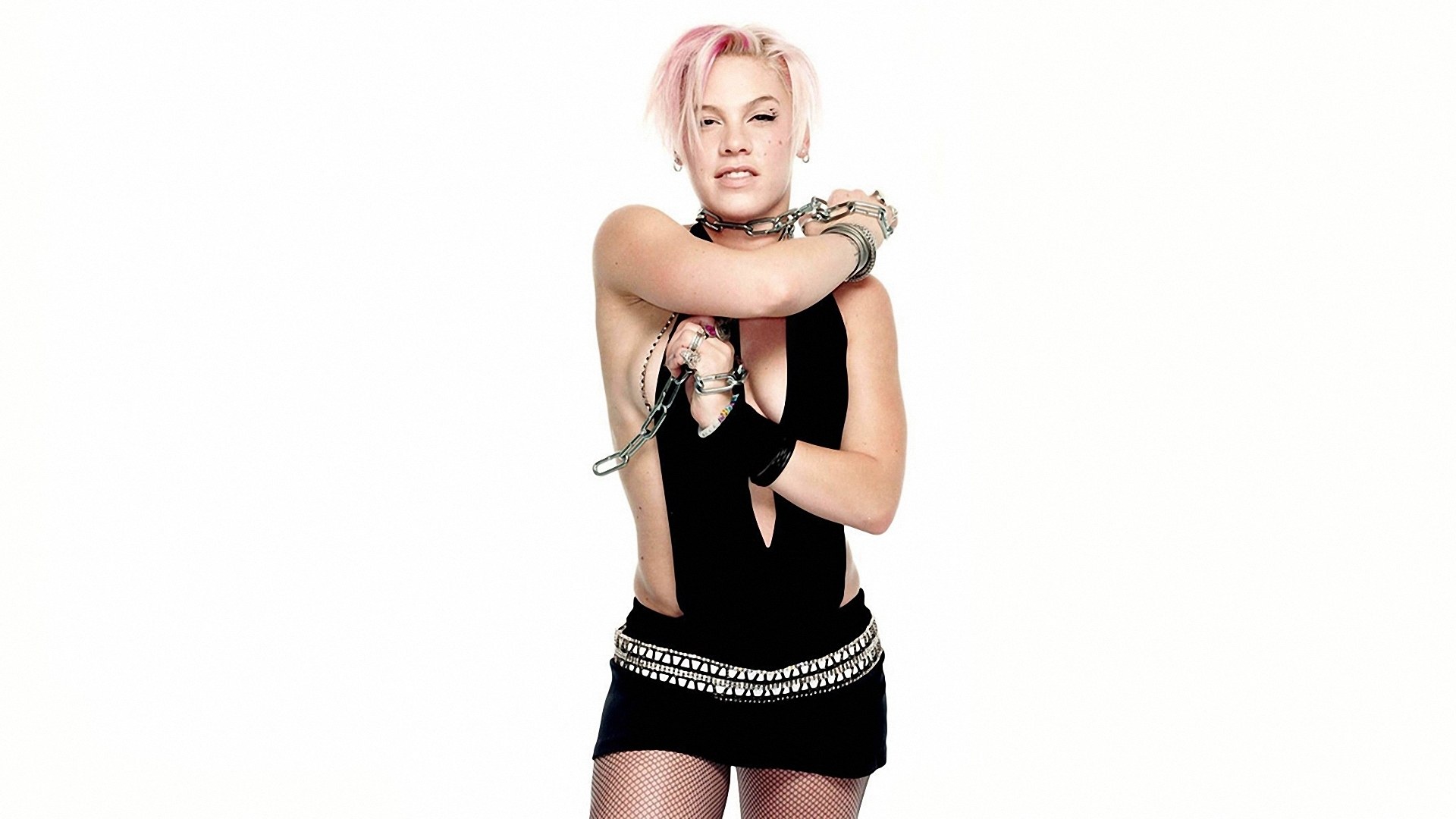 woman with pink hair in chains