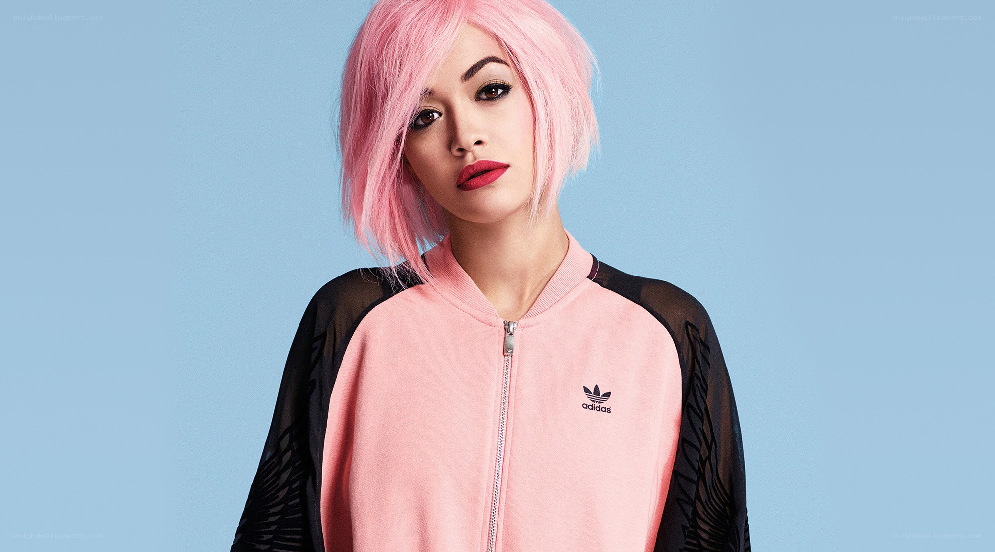 woman with pink hair in pink jacket