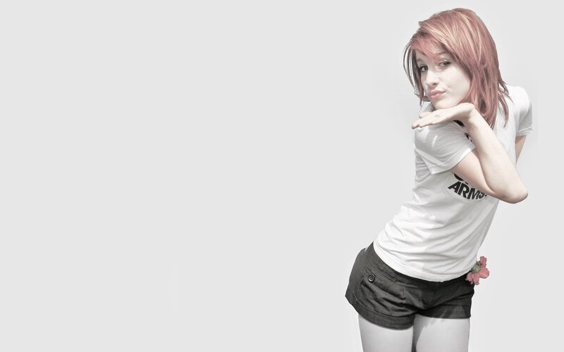 woman with pink hair posing
