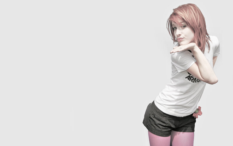 woman with pink hair posing