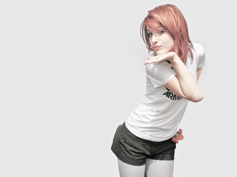 woman with pink hair posing