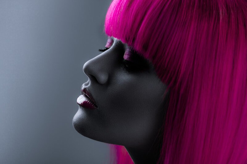 woman with pink hair profile