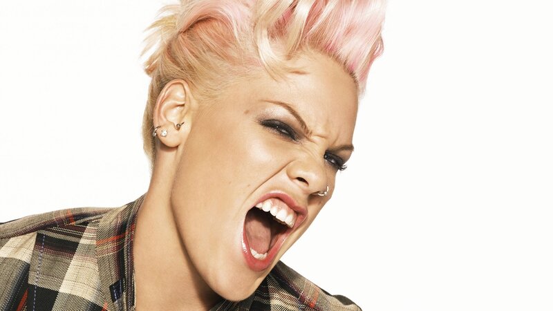 woman with pink hair shouting