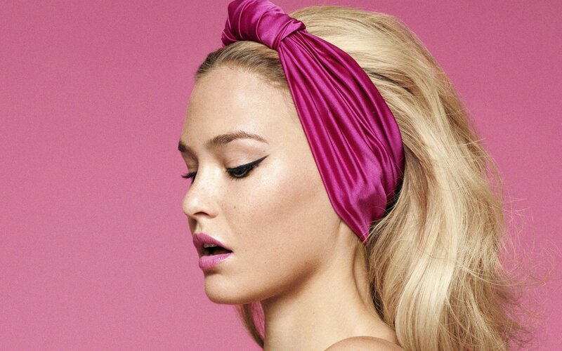 woman with pink headband