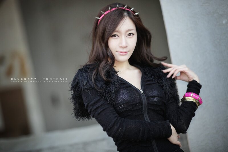 woman with pink headband
