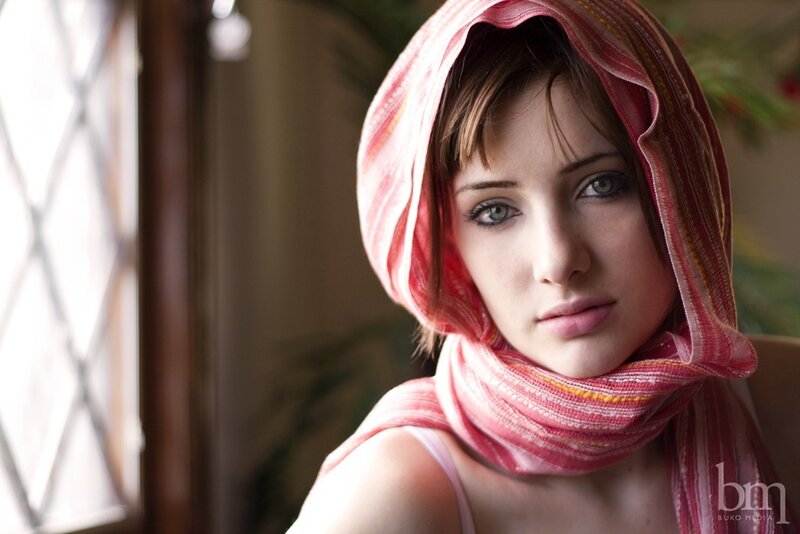 woman with pink headscarf