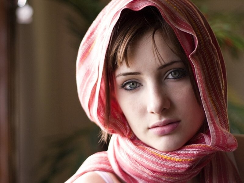 woman with pink headscarf