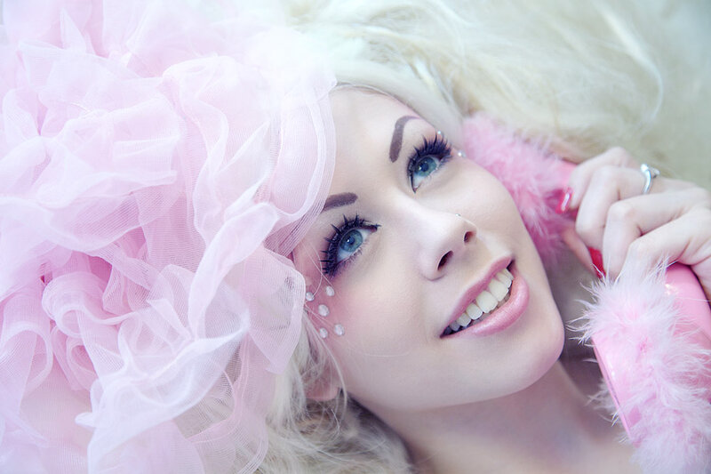 Woman with Pink Headwear
