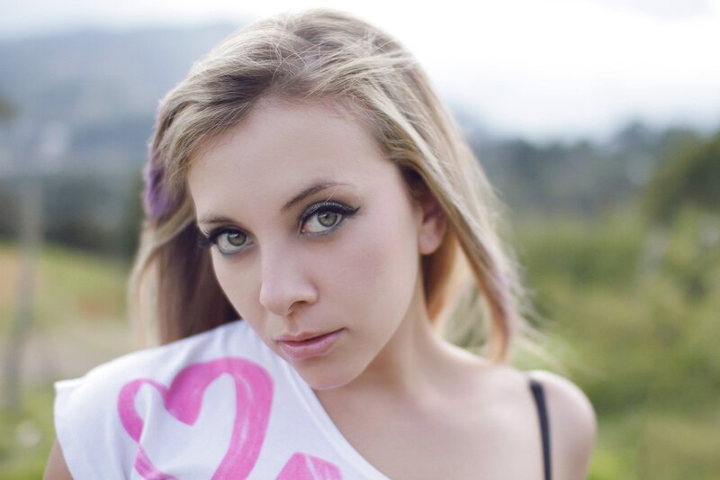 woman with pink heart shirt