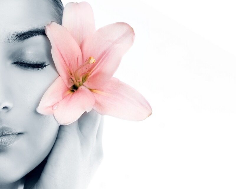 woman with pink lily flower