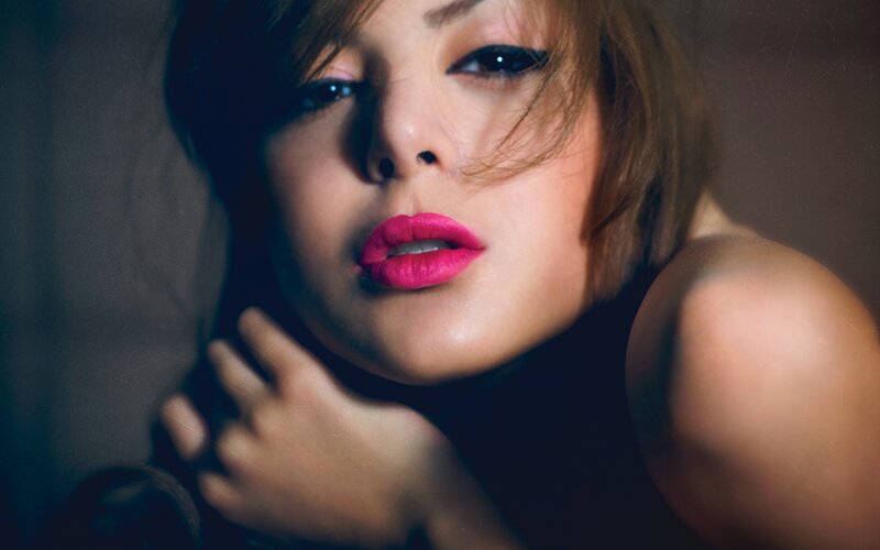 woman with pink lipstick