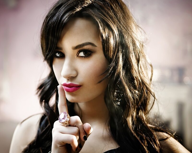 woman with pink lipstick and ring