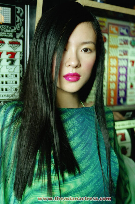 woman with pink lipstick in arcade
