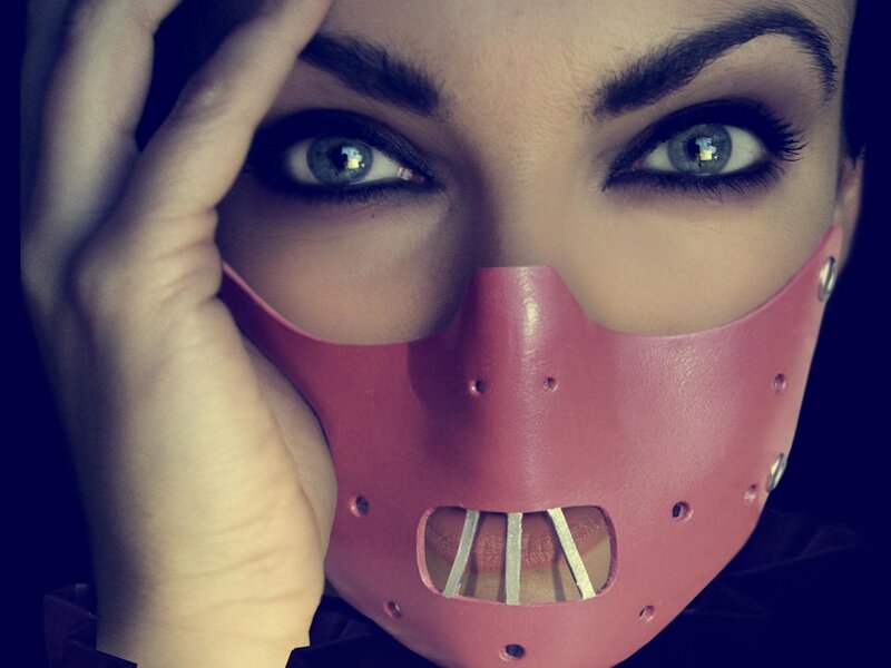 woman with pink muzzle mask