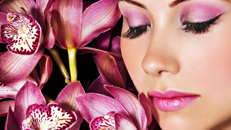 woman with pink orchids