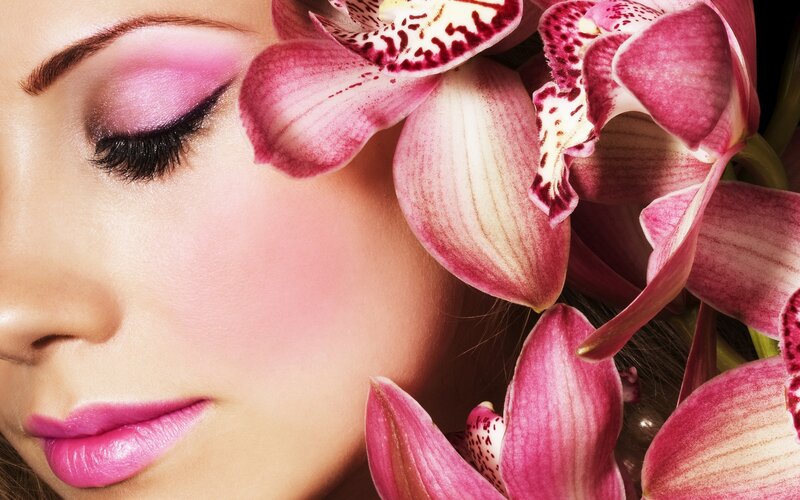 woman with pink orchids