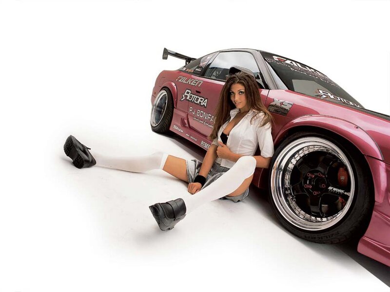Woman with pink race car