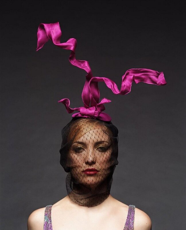 woman with pink ribbon hat