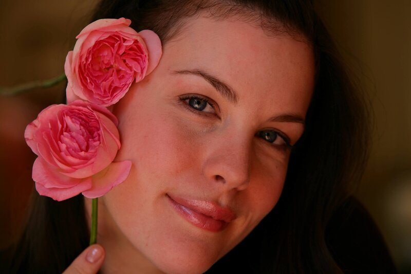 woman with pink roses