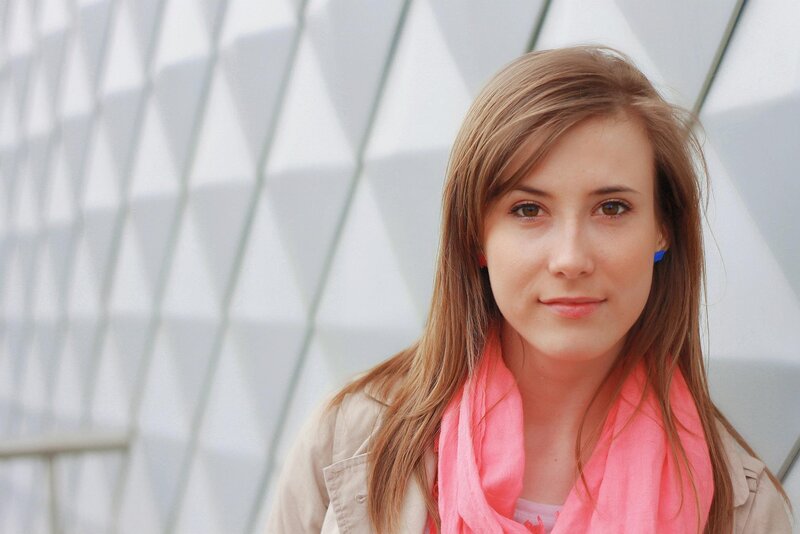 woman with pink scarf