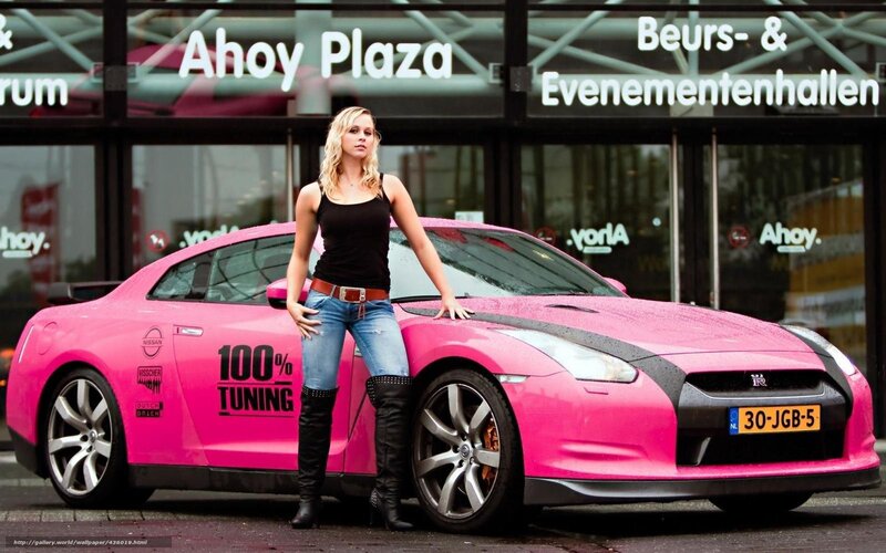 woman with pink sports car