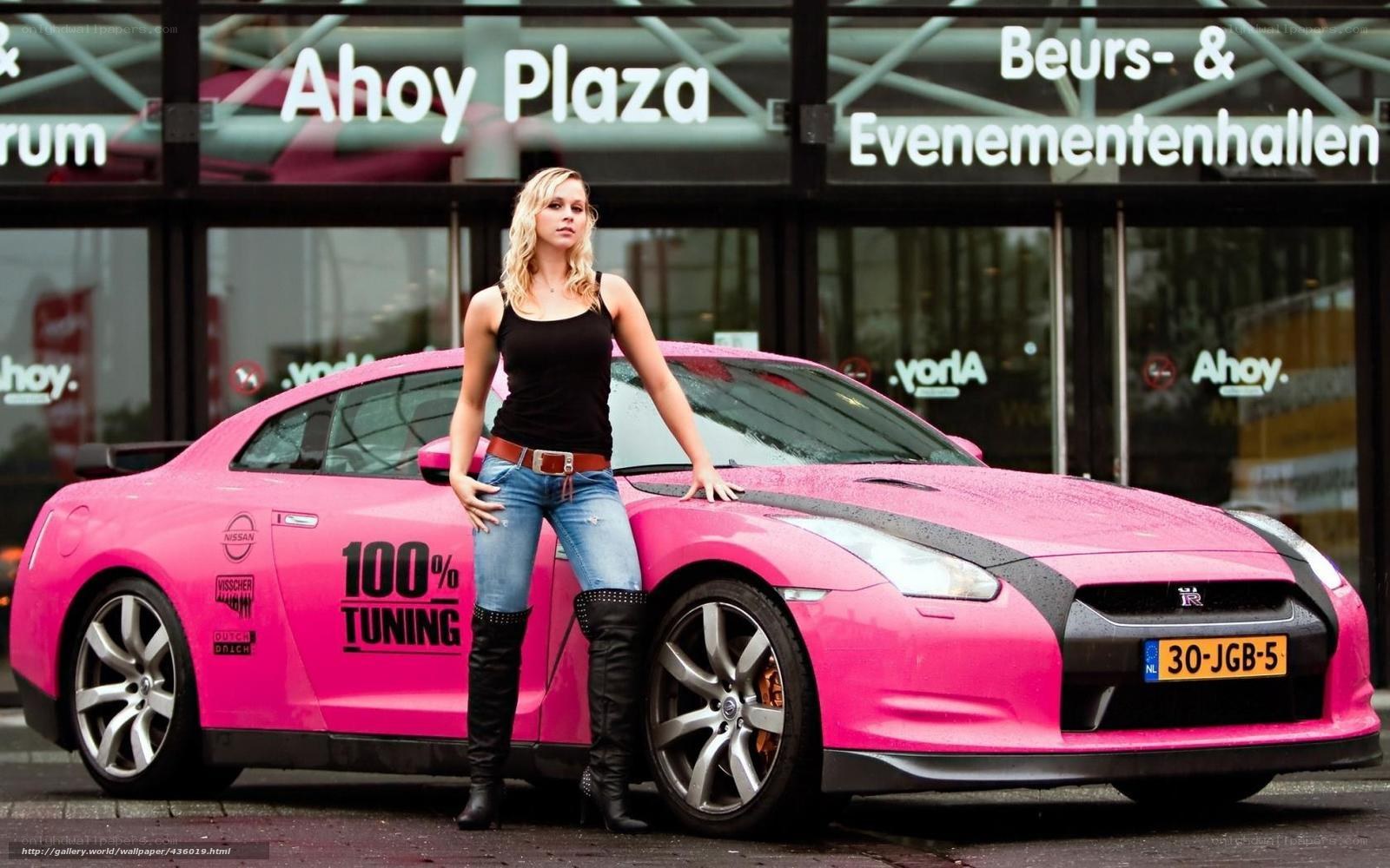 woman with pink sports car
