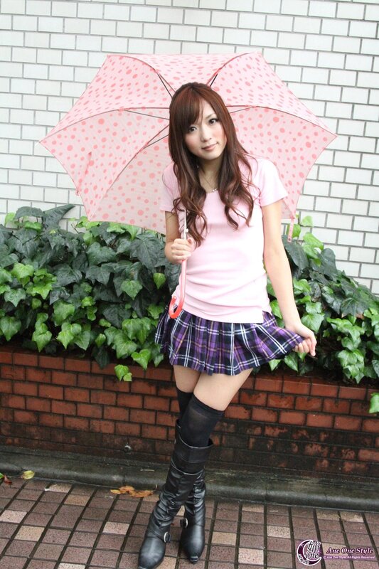 Woman with pink umbrella