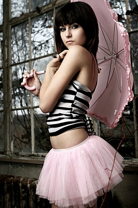 woman with pink umbrella